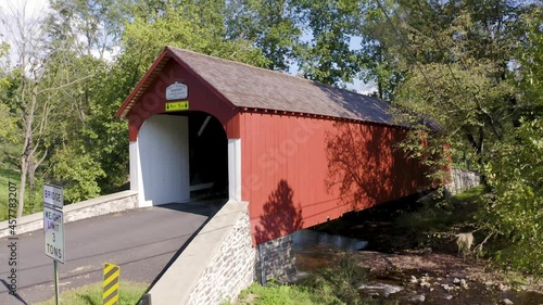 KNECHT'S COVERED BRIDGE IN BUCKS COUNTY, PENNSYLVANIA. BUILT IN 1873. NATIONAL REGISTER OF HISTORIC PLACES.  CROSSES COOKS CREEK. 110ft long 15ft wide. photo