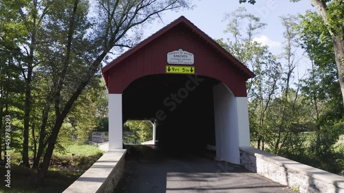 KNECHT'S COVERED BRIDGE IN BUCKS COUNTY, PENNSYLVANIA. BUILT IN 1873. NATIONAL REGISTER OF HISTORIC PLACES.  CROSSES COOKS CREEK. 110ft long 15ft wide. photo