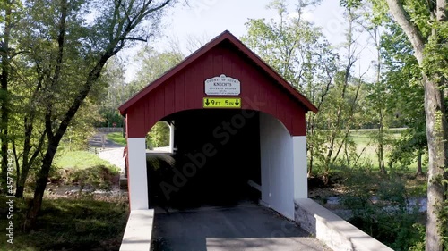 KNECHT'S COVERED BRIDGE IN BUCKS COUNTY, PENNSYLVANIA. BUILT IN 1873. NATIONAL REGISTER OF HISTORIC PLACES.  CROSSES COOKS CREEK. 110ft long 15ft wide.