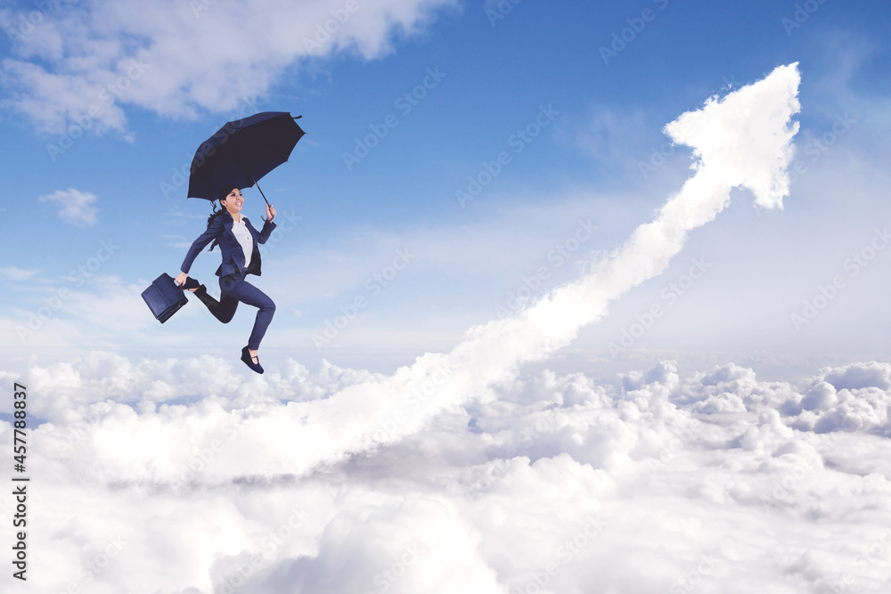 Female manager holds umbrella above upward arrow Female manager holds umbrella above upward arrow
