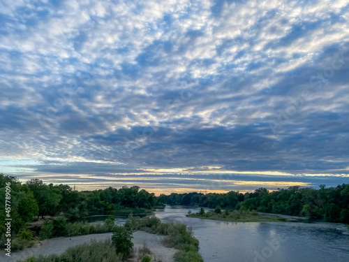 Cloudy sunset over the river 