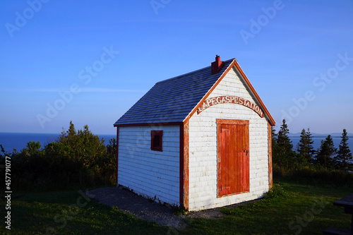 Old shed at lighthouse station at Land's End on Cap-Gaspé in Florillon National Park 