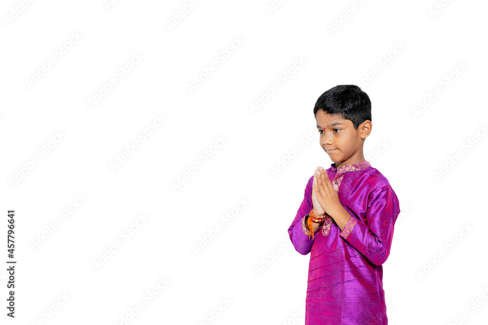 Indian Little Boy in traditional wear and praying Indian Little Boy in traditional wear and praying