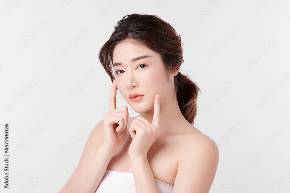 Beautiful young asian woman with clean fresh skin on white background, Face care, Facial treatment, Cosmetology, beauty and spa, Asian women portrait. Beautiful young asian woman with clean fresh skin on white background, Face care, Facial treatment, Cosmetology, beauty and spa, Asian women portrait.