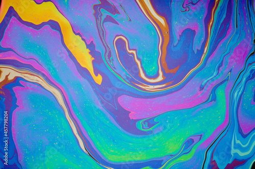 abstract colorful oil flowing on water background.