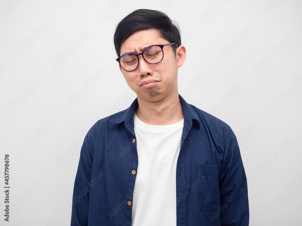Man wearing glasses cry in sad emotion white background