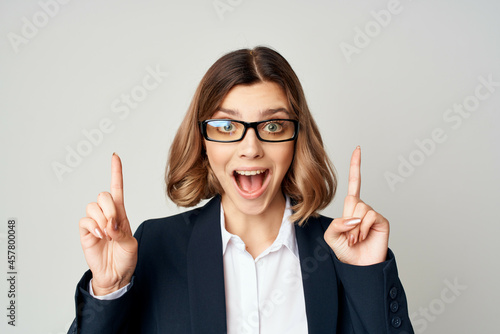 Wallpaper Mural cheerful business woman in suit gesturing with hands official work Torontodigital.ca