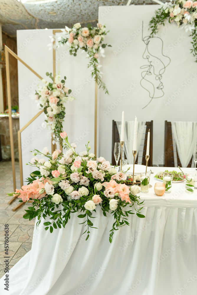 Beautiful floral compositions in the restaurant for the wedding ceremony Beautiful floral compositions in the restaurant for the wedding ceremony