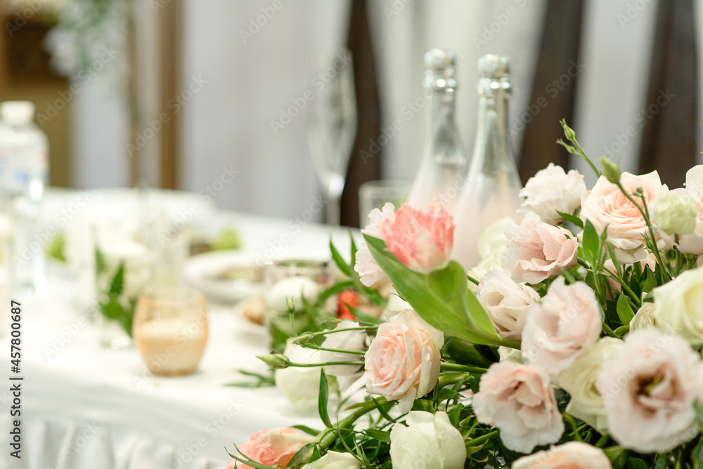 Beautiful floral compositions in the restaurant for the wedding ceremony Beautiful floral compositions in the restaurant for the wedding ceremony