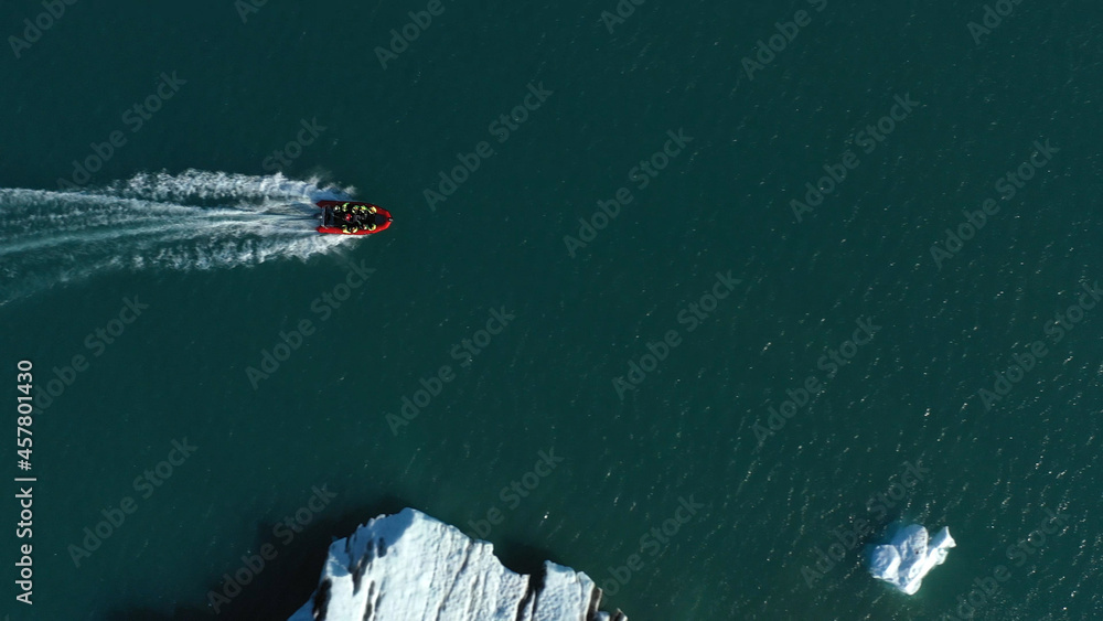 Tourists speed  Boat
at Glacier Lagoon aerial 
drone shot from Jökulsárlón Iceland, September, 2021
