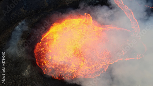 Aerial view over volcanic eruption, Mount Fagradalsfjall
lava spill out of the crater  Mount Fagradalsfjall, September 2021, Iceland 
 photo