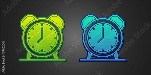 Green and blue Alarm clock icon isolated on black background. Wake up, get up concept. Time sign. Vector