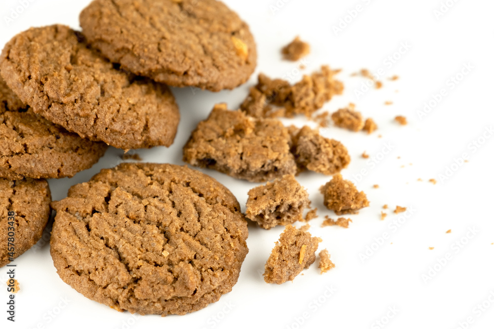 Delicious tasty snack of brown cookies with peanut isolated on white background Delicious tasty snack of brown cookies with peanut isolated on white background