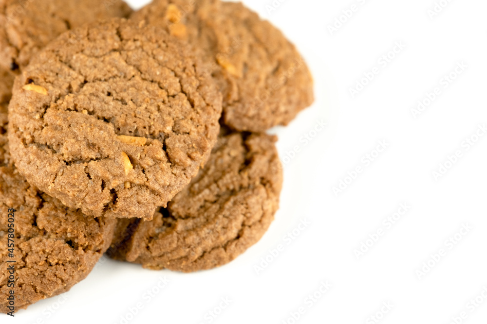 Delicious tasty snack of brown cookies with peanut isolated on white background Delicious tasty snack of brown cookies with peanut isolated on white background