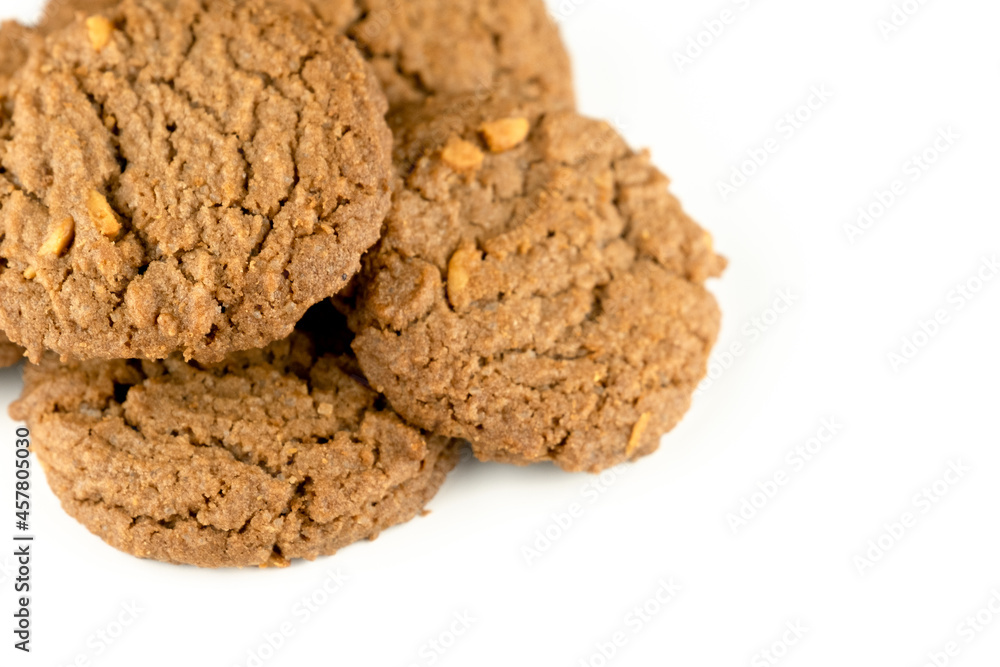 Delicious tasty snack of brown cookies with peanut isolated on white background Delicious tasty snack of brown cookies with peanut isolated on white background