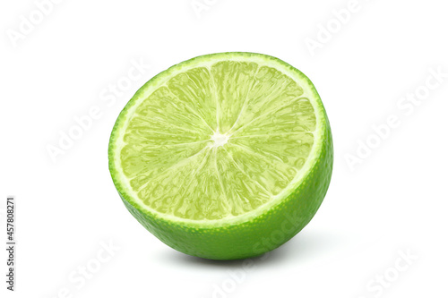 Fresh lime cut in half isolated on white background.