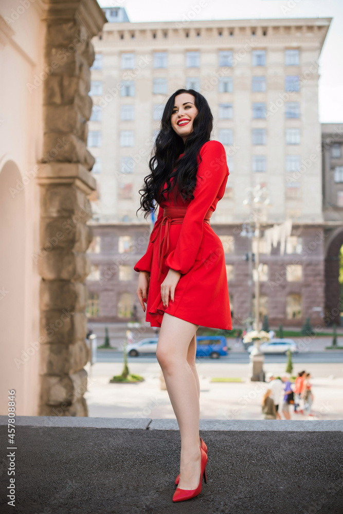 European Woman with dark hair and pale skin, in vintage style at city, fashionable outdoor portrait