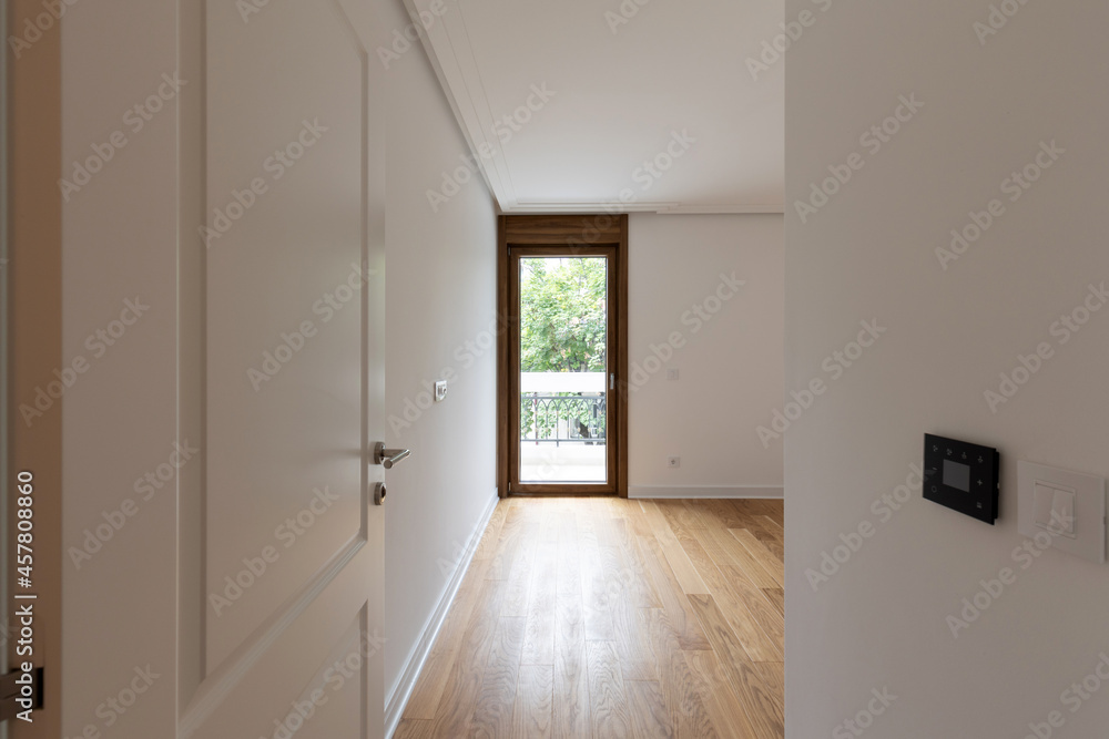 Full hight floor to ceiling doors in empty apartment interior Full hight floor to ceiling doors in empty apartment interior