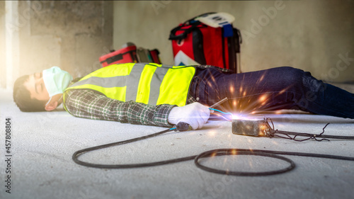 Construction workers carelessly connect wires causing unconscious electric shocks. Accident electrocuted, Electrical workers carelessly, causing electric shock accidents