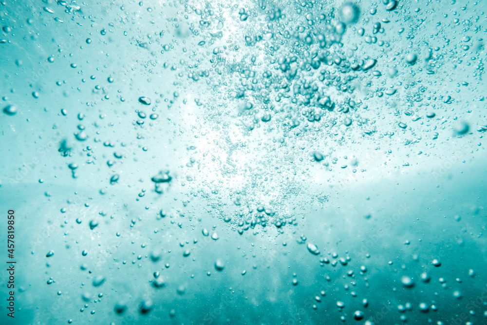 Underwater View of Bubbles In Deep Blue Ocean. Close Up Water. Background Underwater View of Bubbles In Deep Blue Ocean. Close Up Water. Background