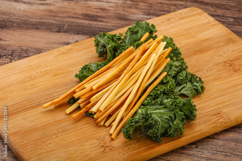 Chechel cheese sticks over board