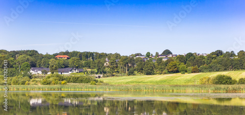 Panorama of houses on the hill in the landscape of Hobro, Denmark