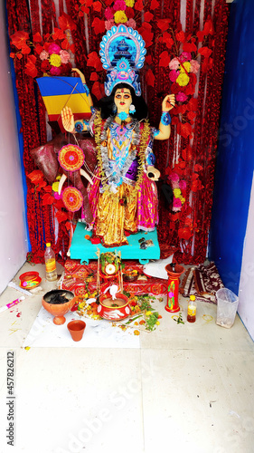 A finished clay idol of Lord vishwakarma in a stage for worship at kolkata.selective focus. photo