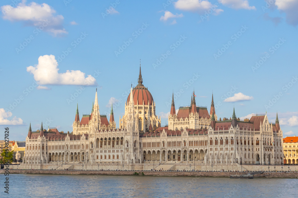 BUDAPEST, HUNGARY - AUGUST 19, 2021: the Hungarian parliament building view from the Danube river
