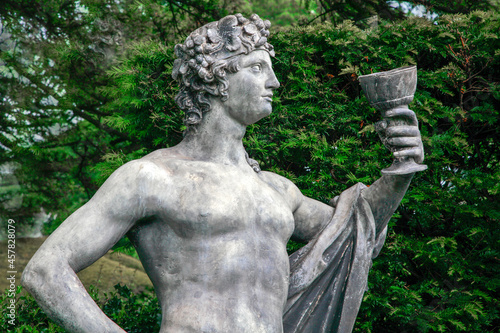Sculpture of a Bacchus drinking from a goblet at Hardwick Hall, Derbyshire, England photo