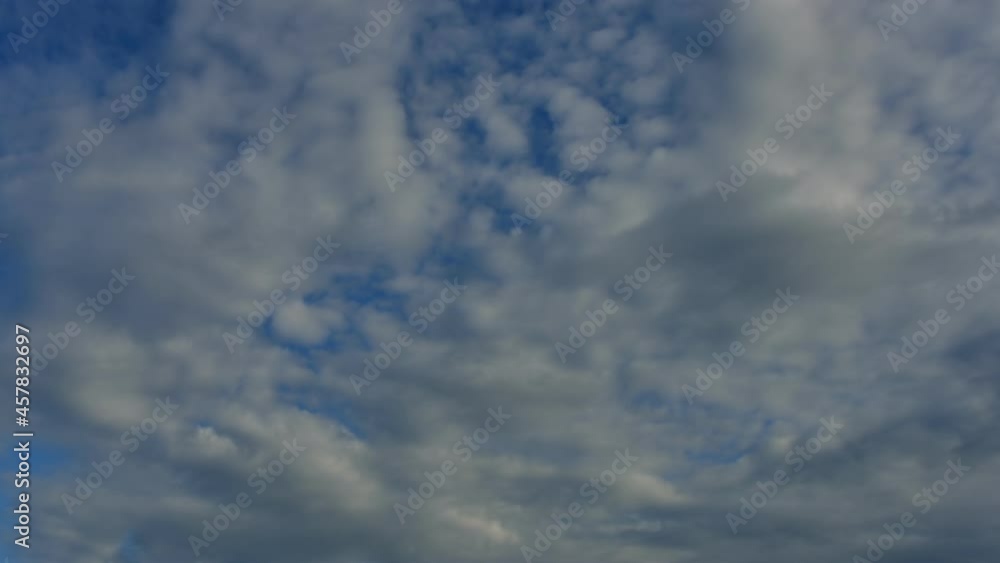 4K Time lapse, Beautiful motion white clouds on blue sky background. Video footage time lapse of puffy fluffy white clouds blue sky. 4K Time lapse, Beautiful motion white clouds on blue sky background. Video footage time lapse of puffy fluffy white clouds blue sky.