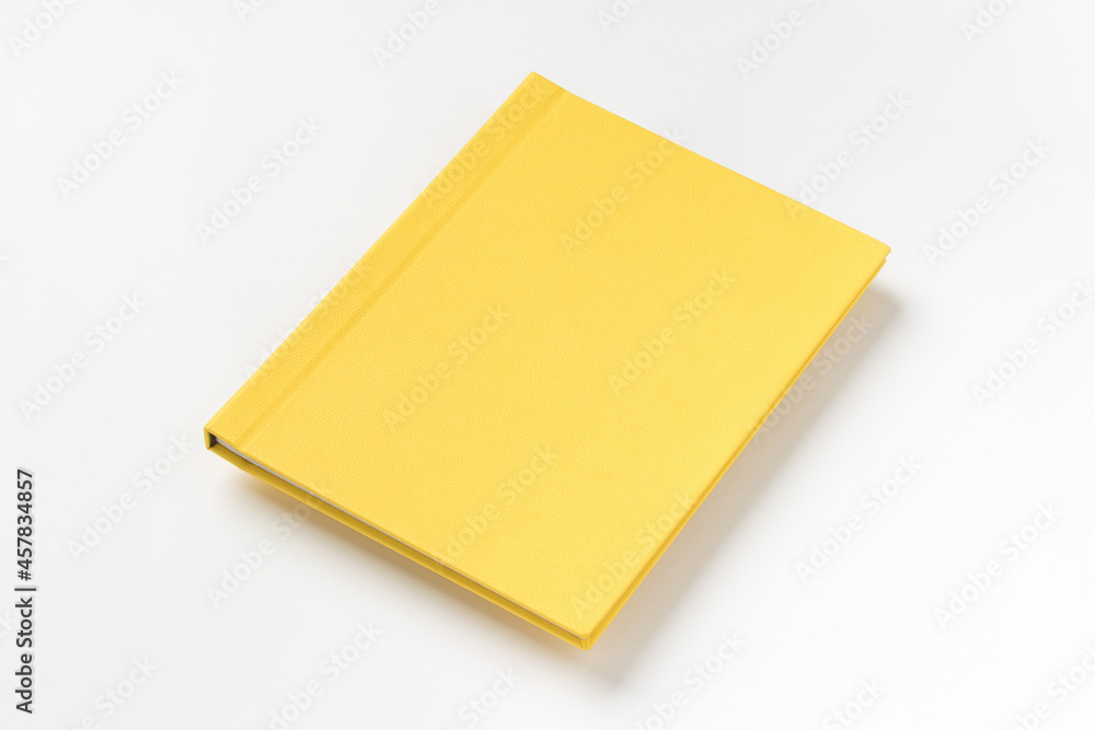 Yellow hardcover book, isolated on white background Yellow hardcover book, isolated on white background
