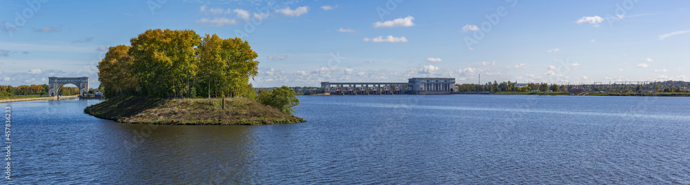 Hydroelectric power station on the Volga river in Yaroslavl region on a sunny day. Launched in 1940. Cultural heritage site. Uglich, Russia Hydroelectric power station on the Volga river in Yaroslavl region on a sunny day. Launched in 1940. Cultural heritage site. Uglich, Russia