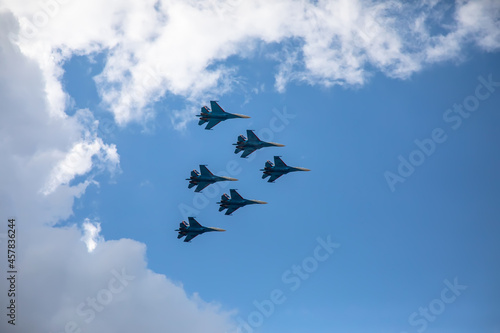 Konstfotografi Combat aircraft are flying against the background of the sky