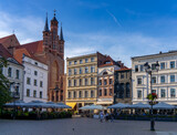 view of the main square in historic old town of Torun with Saint Mary's church
