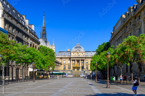 Fototapeta Naklejka Na Ścianę i Meble -  Square Louis Lepine and Palais de Justice de Paris (Palace of Justice) in Paris, France.  Cozy cityscape of Paris. Architecture and landmarks of Paris.