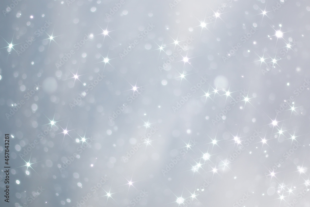 Fototapeta premium blue snowfall bokeh background, abstract snowflake background on blurred abstract blue