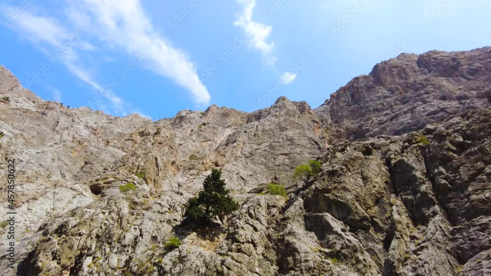 Huge steep cliffs, a canyon on the Euphrates River, Dramatic geological wonder. Beautiful background and unusual landscape, 4k gimbal shoot Huge steep cliffs, a canyon on the Euphrates River, Dramatic geological wonder. Beautiful background and unusual landscape, 4k gimbal shoot