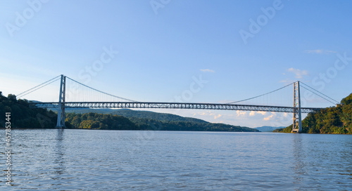 Fototapeta Naklejka Na Ścianę i Meble -  Full span of the Bear Mountain Bridge as seen from the Hudson River