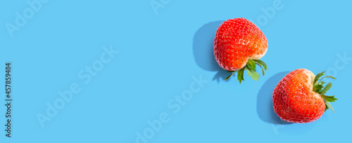 Fresh red strawberries overhead view - flat lay