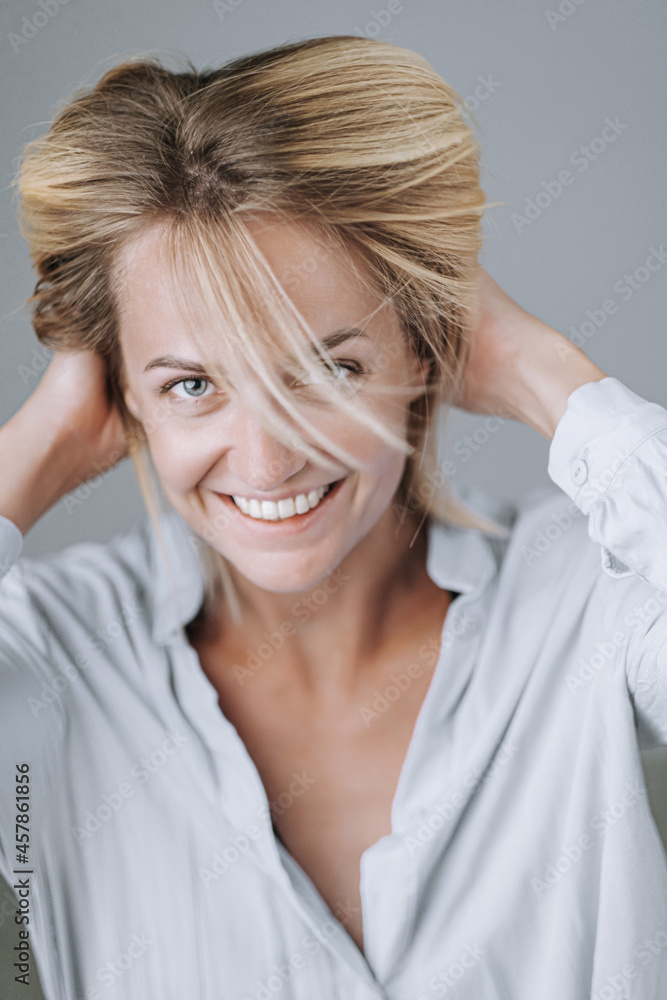 portrait of a young and energetic woman in her early forties with beautiful healthy skin and teeth. portrait of a young and energetic woman in her early forties with beautiful healthy skin and teeth.