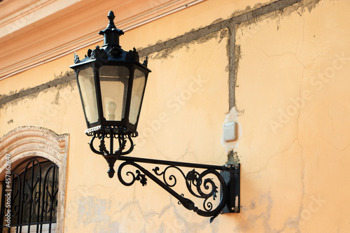 Old street light lantern on bilding