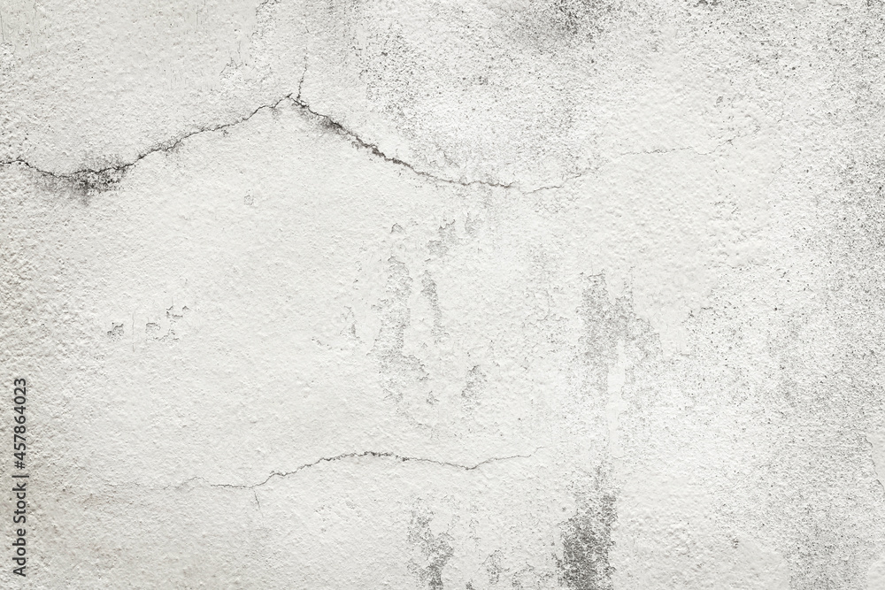 White grey old wall texture with cracked and peeled in vintage style for background and design art work. White grey old wall texture with cracked and peeled in vintage style for background and design art work.