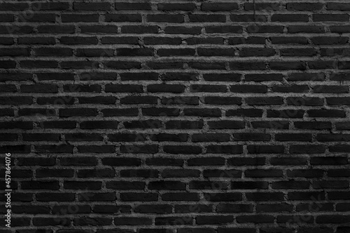 Black grey brick wall texture background with old dirty and vintage style pattern.