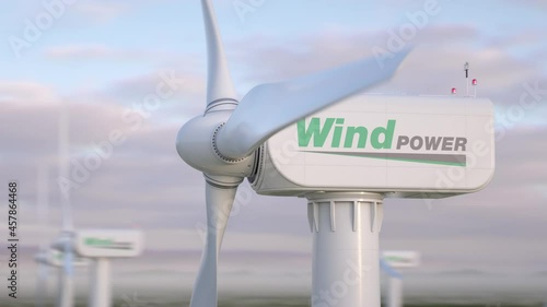 Video 4K closeup of large wind turbine seen from above with generic 