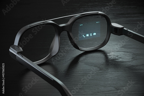 Smart glasses with proection on the screen. VR virtual reality and AR augmented reality technology concept. photo