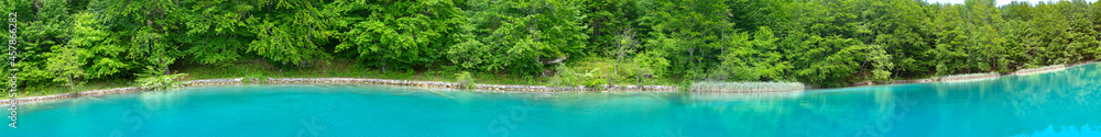 Beautiful landscape, green forest and clear water. River bank wide panorama. croatia.
