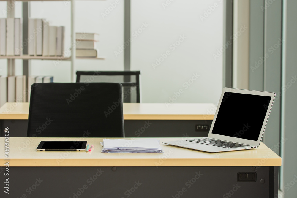 Computer notebook on desk in office Computer notebook on desk in office