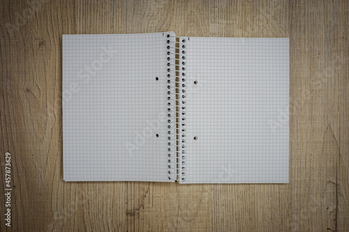 Blank notebook on wood table