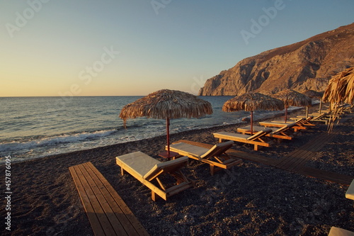 Fototapeta Naklejka Na Ścianę i Meble -  Sunrise view of Kamari Beach, Santorini, Greece