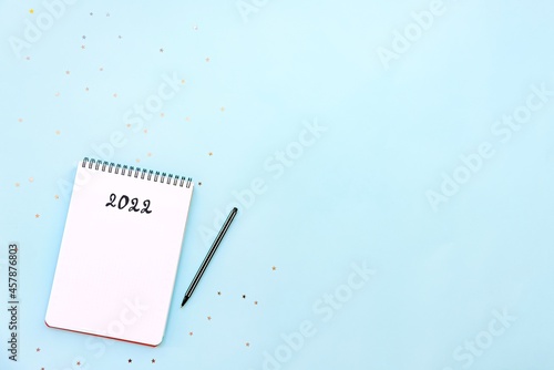 Obraz na płótnie Top view of empty notebook ready for New 2022 Year resolutions or wish list. Copy space. w salonie